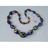 A good string of glass millefiori beads