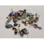 a bag of assorted silver earrings