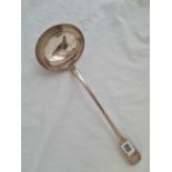 A heavy early Victorian soup ladle, plain fiddle pattern - London 1839 by WE - 294 g.