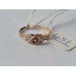 A ruby and diamond ring 9ct size O - 1.4 gms