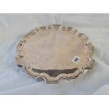 A plain salver with pie crust border, three scroll feet - 12" diameter - Sheffield 1910 - 870 g.