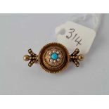 A early Victorian pretty target bar brooch with turquoise and pearl set in high carat