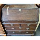 An early 18th Century oak bureau of good colour with fitted interior - 3ft 3" wide