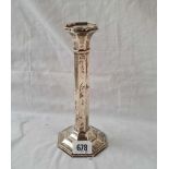 A singular candlestick of octagonal form - 8" high - Birmingham 1933