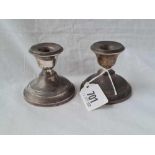 A pair of dwarf circular candlesticks with reeded rims - 2.5" high - Birmingham 1919