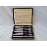 A boxed set of six silver handled tea knives