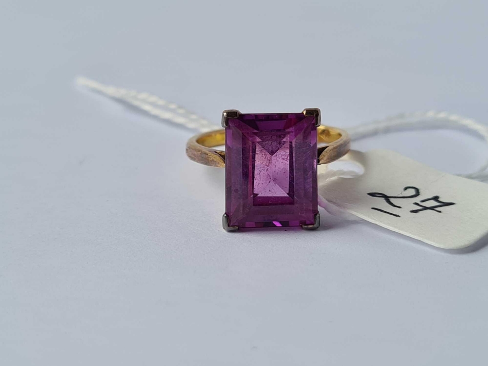 A rectangular purple stone 10k dress ring size J 4g