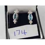 A pair of topaz and diamond earrings 18ct gold