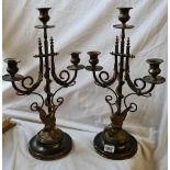 A pair of decorative Victorian three light brass candelabra with bird and snake decoration - 15"