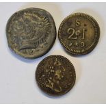 Two old coin weights plus another