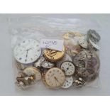 A bag of assorted watch movements