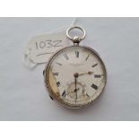 A large gents silver pocket watch by John Forrest with seconds sweep but with damaged face