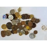 Jar of coins and badges