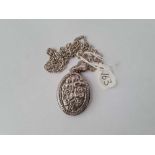 A silver vintage oval locket floral engraved on silver chain 18g