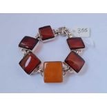 A silver and amber bracelet 39g inc