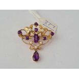 A contempory amethyst and pearl brooch/pendant