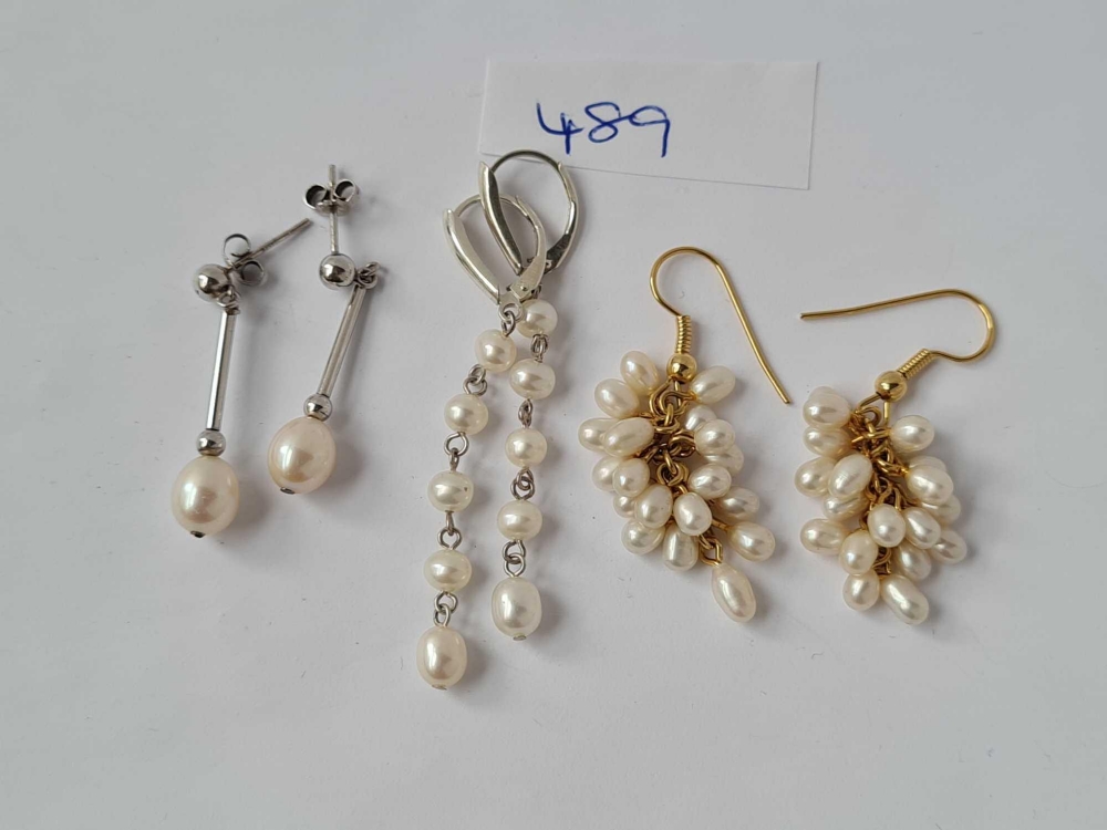 two pairs silver and pearl drop earrings etc.