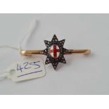 A pretty 15ct gold diamond and enamel star shaped bar brooch with inscription HONI SOIT QUI MAL Y