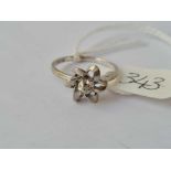 A diamond set 14ct white gold flower head ring size L ½