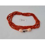 A very long (50”) vintage coral necklace