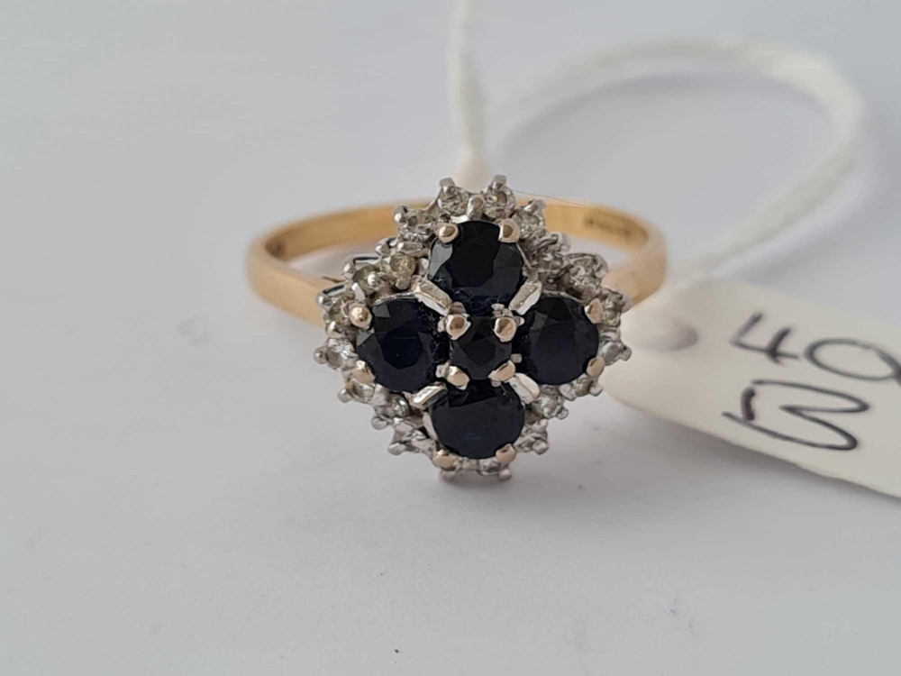 A LARGE SAPPHIRE AND DIAMOND RING 18CT GOLD SIZE R - 5.6 GMS