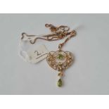 A art Nouveau and pearl and peridot pendant 15ct gold on 9ct neck chain