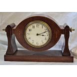 An Edwardian mantel clock in an inlaid mahogany case. 6.5" high.