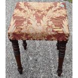 An early Victorian and mahognay framed stool on turned legs.