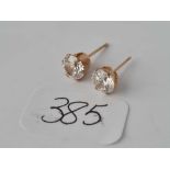 A pair of 9ct CZ ear studs