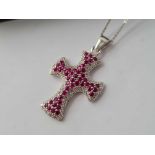 A fine ruby encrusted cross pendant 9ct white gold - 6 gms