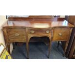 A George III small serpentine shaped sideboard, the front with four legs