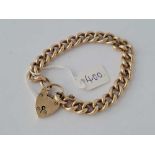 A GOOD CURB LINK BRACELET WITH HEART PADLOCK CLASP - 42 GMS