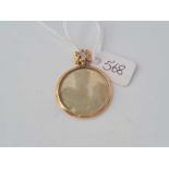 A double sided 9ct glass locket