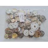 A bag of assorted watch movements