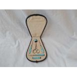 An attractive boxed manicure set with blue enamel, import mark probably London 1924