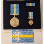 A boxed Hong Kong Service medal for PTE AIP Dockerill Royal Norfolk Reg