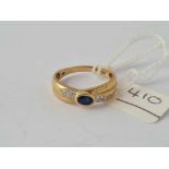 A sapphire and diamond ring 9ct size Q - 2.5 gms