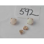A pair of 9ct opal stud earrings