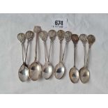 Ten golfing spoons with figure finials - 122 g.