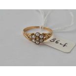 A VICTORIAN PEARL AND DIAMOND DAISEY CLUSTER RING 15CT GOLD SIZE O