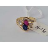 A FINE CROSS OVER RING WITH TEAR DROP RUBY AND SAPPHIRE STONES WITH DIAMOND SHOULDERS 18CT GOLD