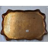 An Art Nouveau copper tray - 24" wide