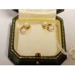 A pair of double pearl cluster earrings 9ct