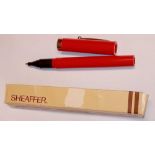Red Shaeffer ballpoint pen in box.