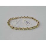 A peridot tennis bracelet 9ct