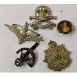 Four cap badges & lapel badge for the Royal Norfolk