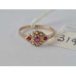 A pretty diamond shaped pearl and ruby ring 9ct size O - 1.5 gms