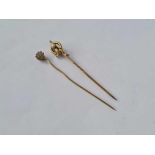 Two gold stick pins - 1.7 gms