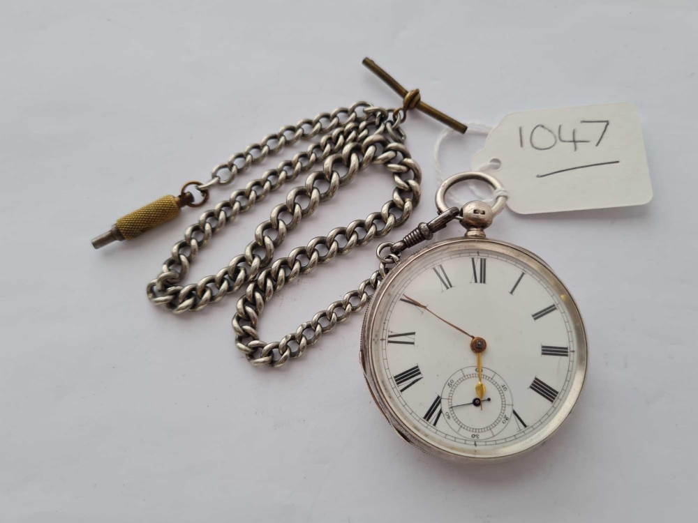 A gents silver pocket watch with seconds dial on curb link metal albert