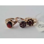 A Victorian 9ct and silver stone set ring and two 9ct vintage garnet rings 7.4g inc